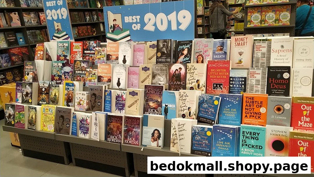 Bookstore interior showing a large display of books, including 'Best of 2019' titles.