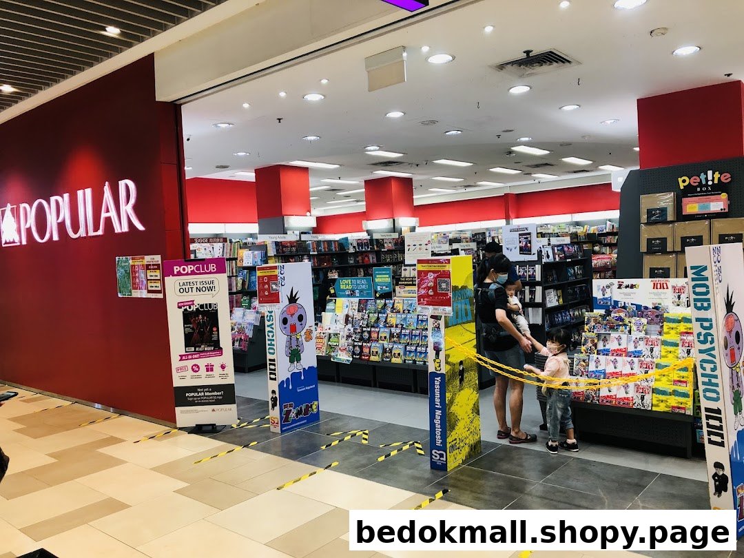 Exterior view of a Popular Bookstore entrance with people and displays.