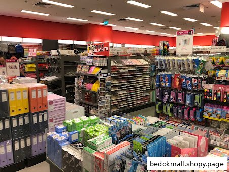 Interior view of a retail store displaying various stationery and craft supplies.