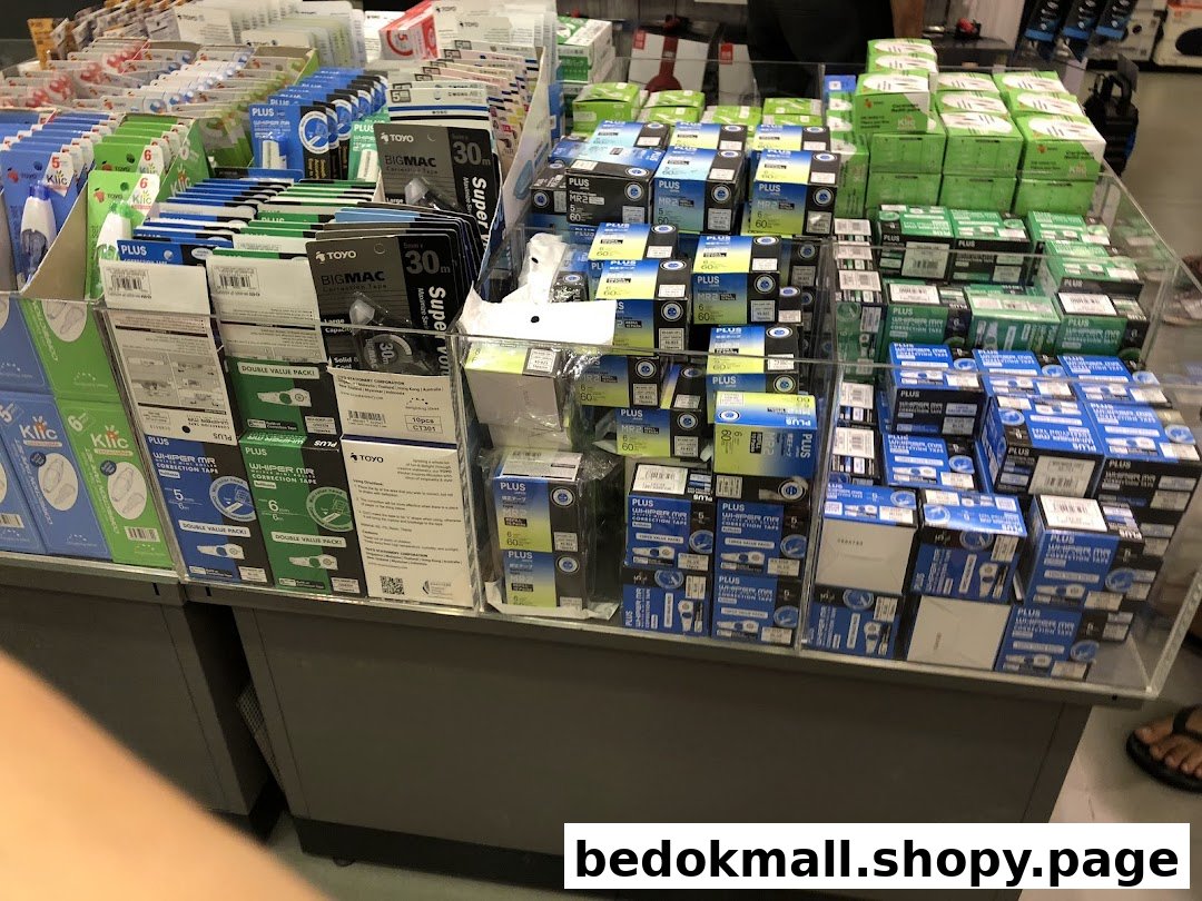 Display of correction tapes and stationery products inside a bookstore.