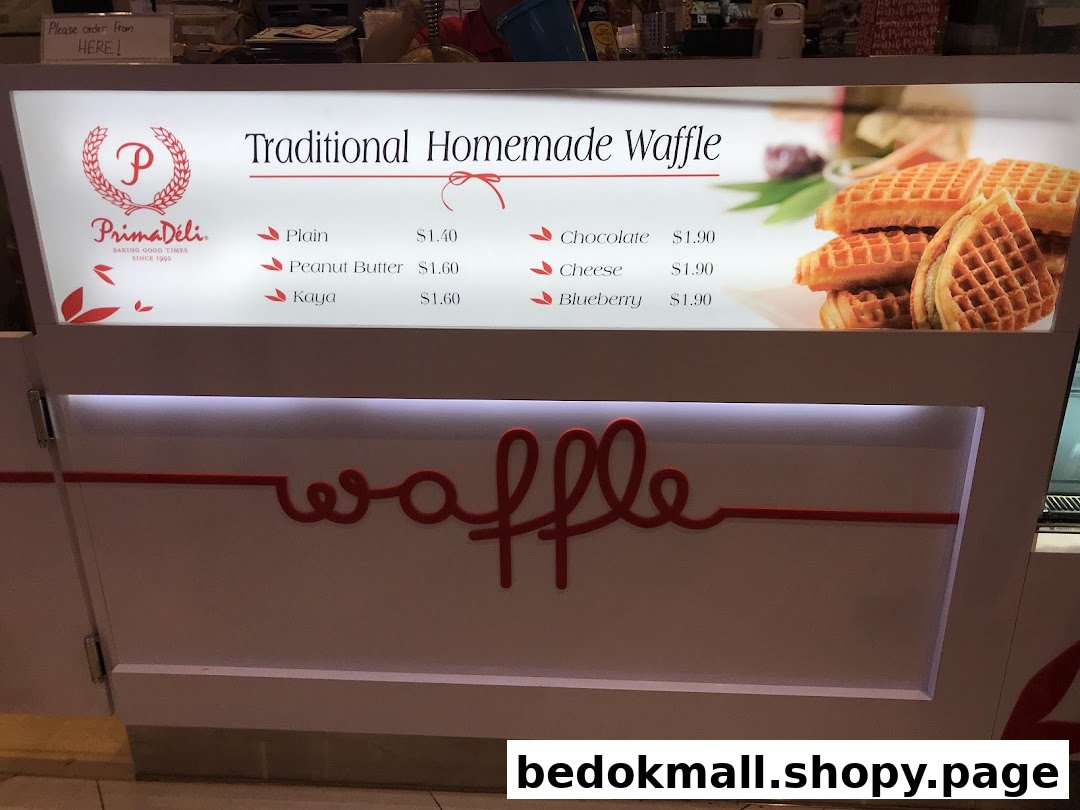 A menu board displaying waffle flavors, prices, and an image of waffles.