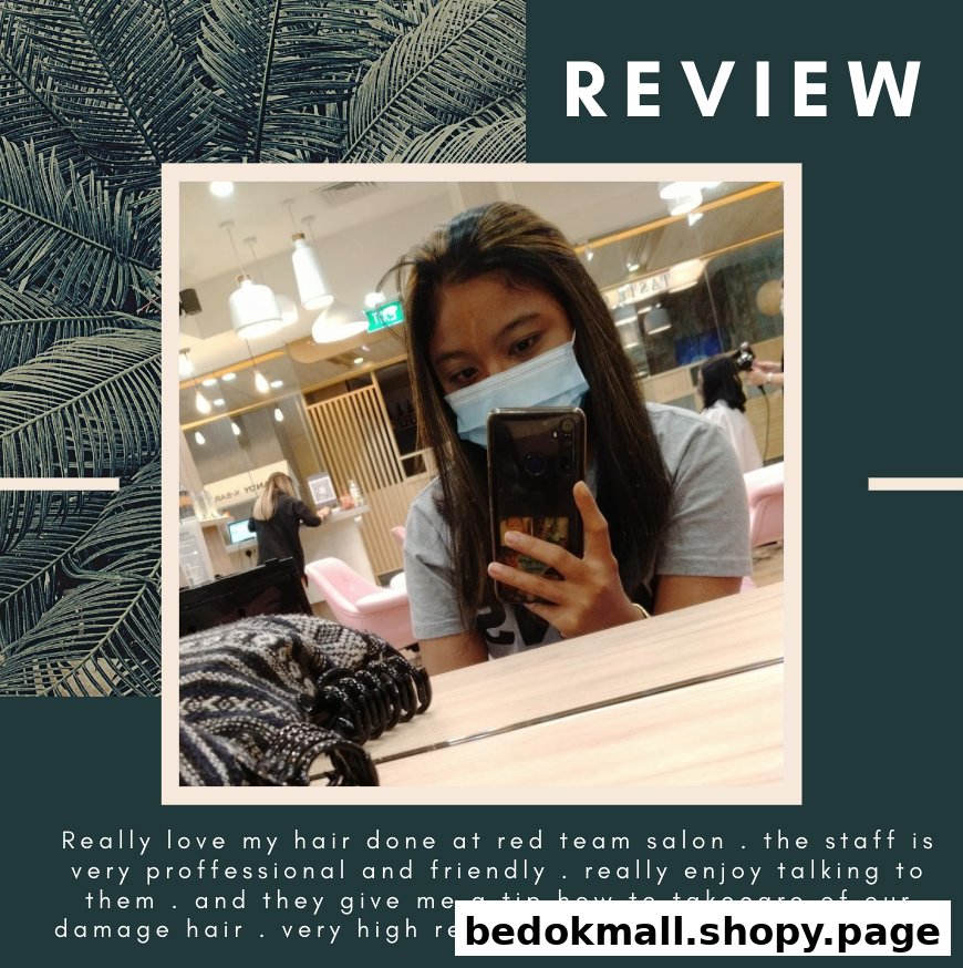 Person taking a selfie inside a hair salon with a review overlay.