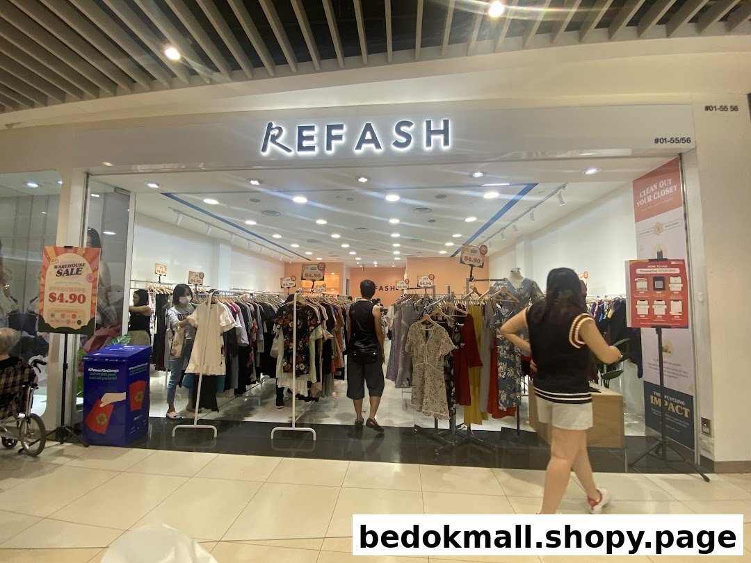 Shop entrance with clothes racks and customers inside REFASH.
