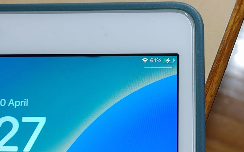 Close-up of a digital device screen showing battery level and Wi-Fi signal.