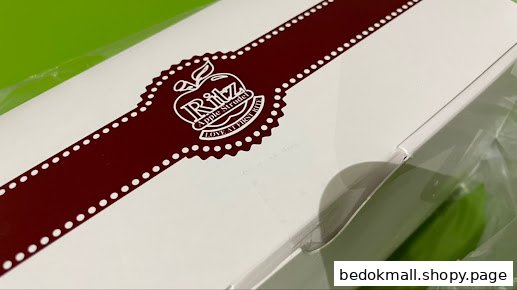 Close-up of a white product box with 'Ritz Apple Strudel' logo.