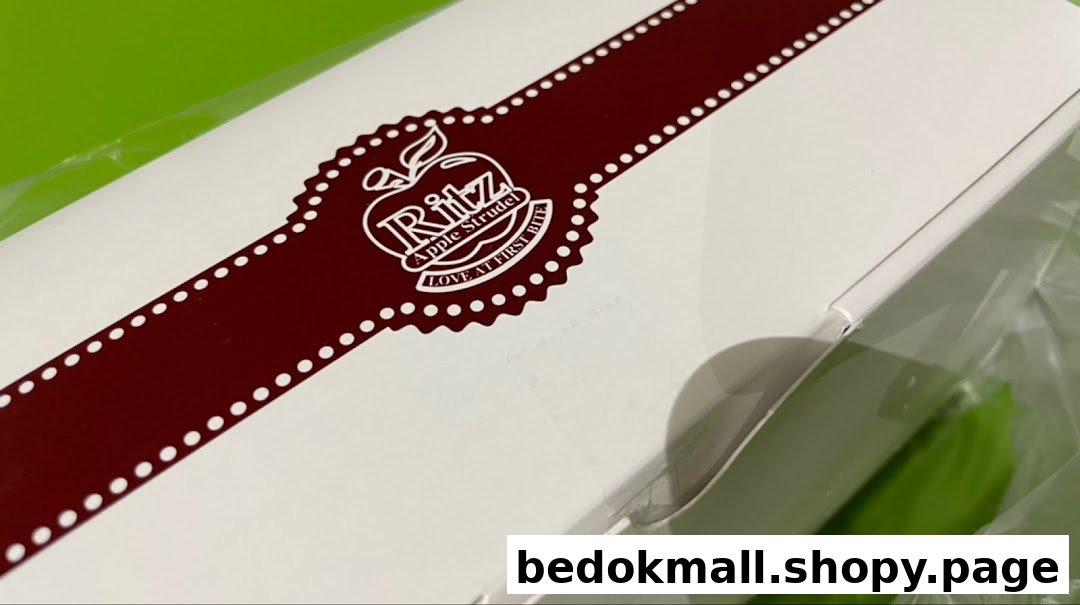Close-up of a white Ritz Apple Strudel product box with logo.