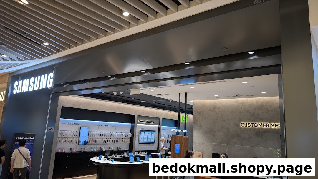 Entrance of a Samsung Experience Store with products and customer service visible inside.