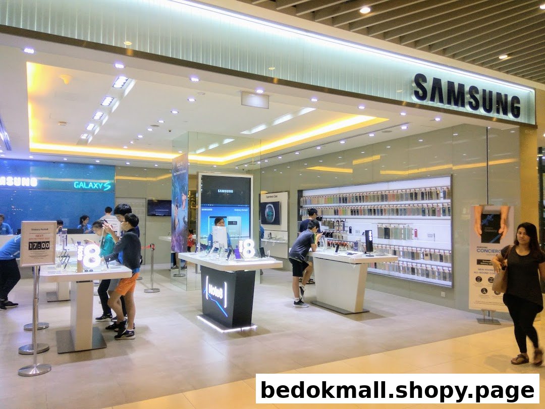 Samsung Experience Store entrance with customers browsing products and displays.