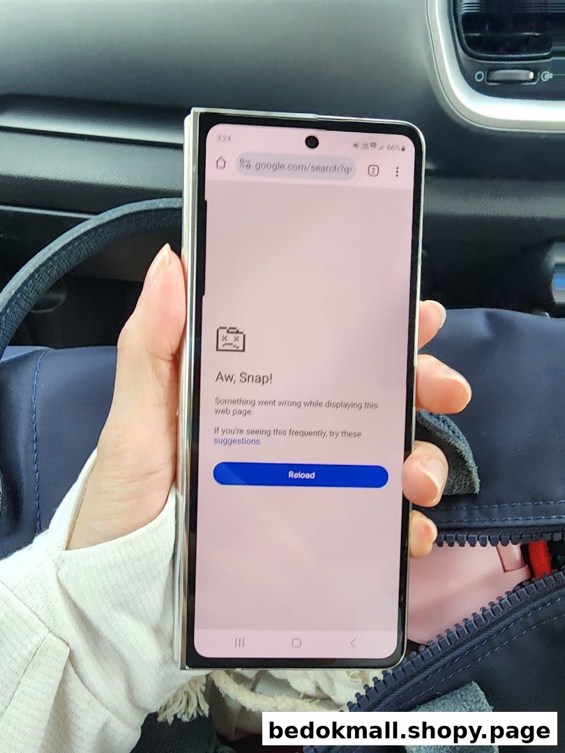A hand holds a smartphone displaying a web page error message.