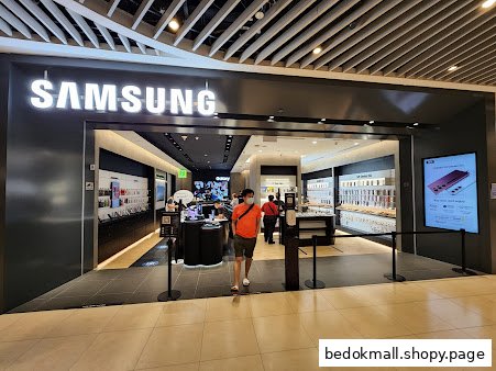 Exterior view of a Samsung Experience Store entrance with customers inside.