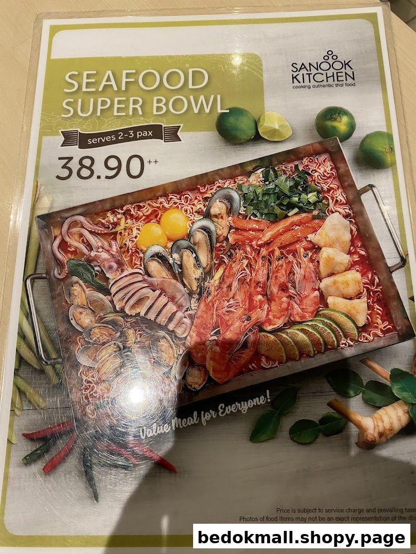 A menu page displaying a 'Seafood Super Bowl' dish with its price and image.