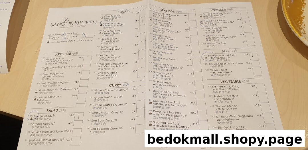 A detailed menu from Sanook Kitchen showing various Thai dishes and prices.