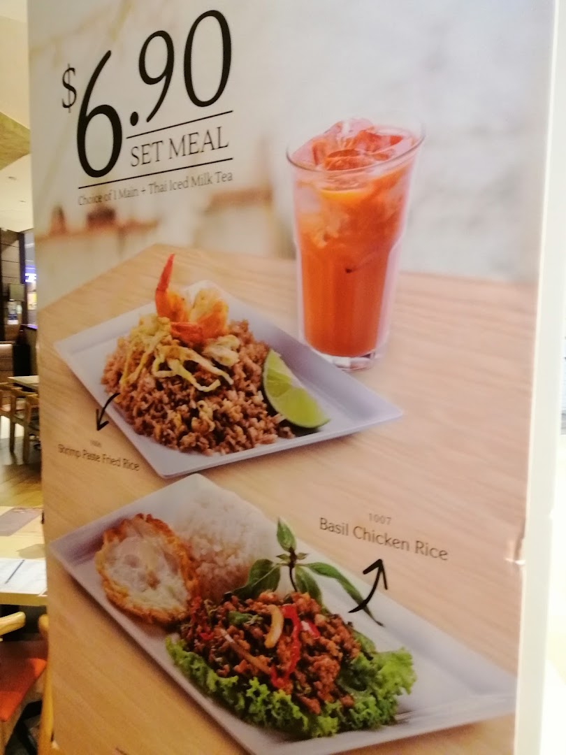 A menu board displaying a set meal with food options, a drink, and price.