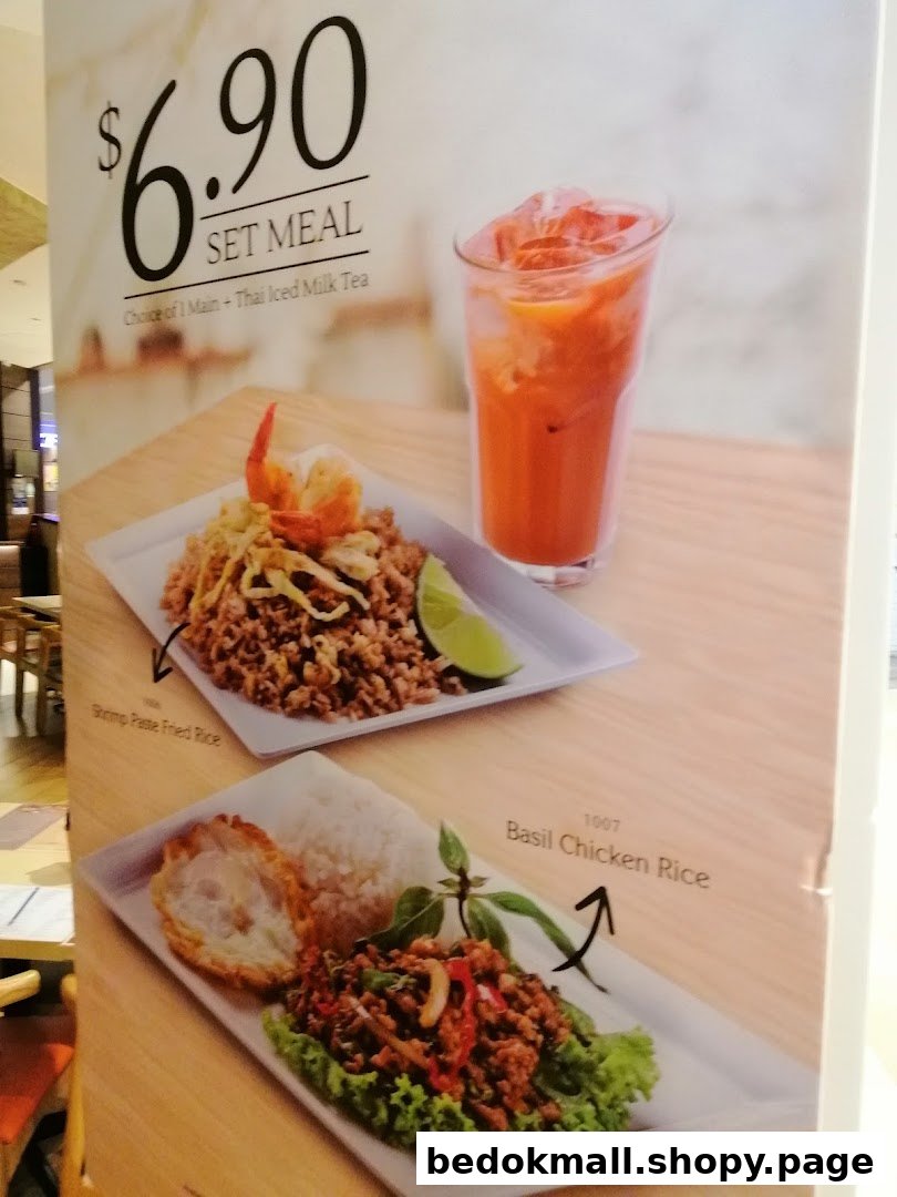 A menu board displaying a set meal with food options, a drink, and price.