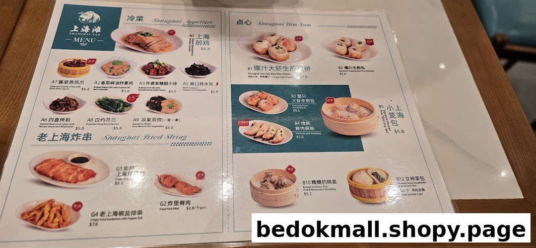 A laminated menu displaying various Chinese dishes with photos and prices.