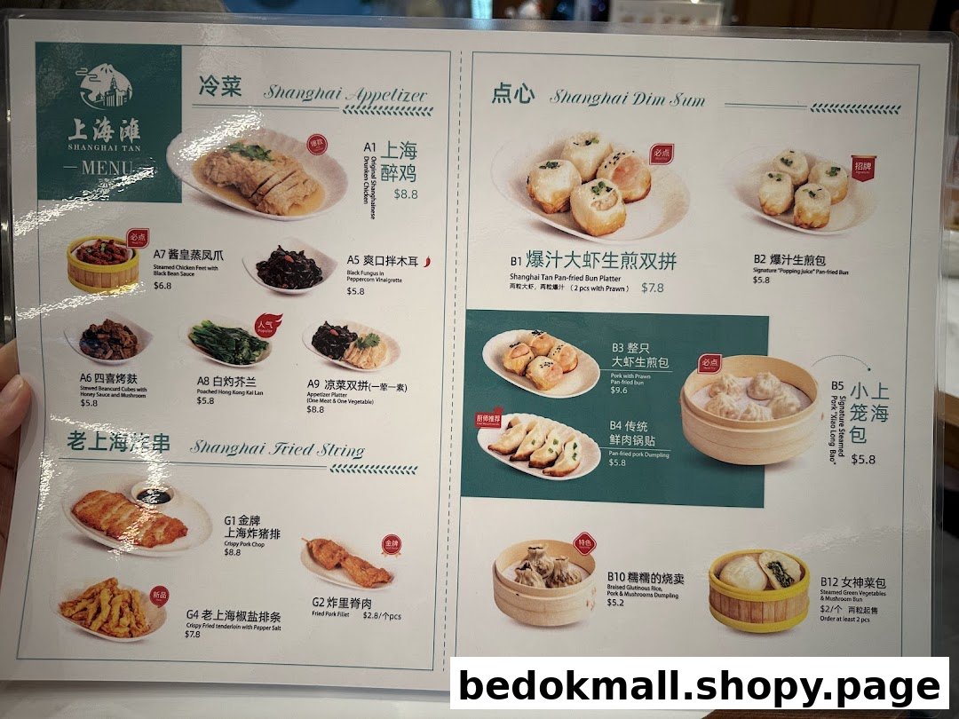 A laminated menu displaying various Chinese food items with prices and images.