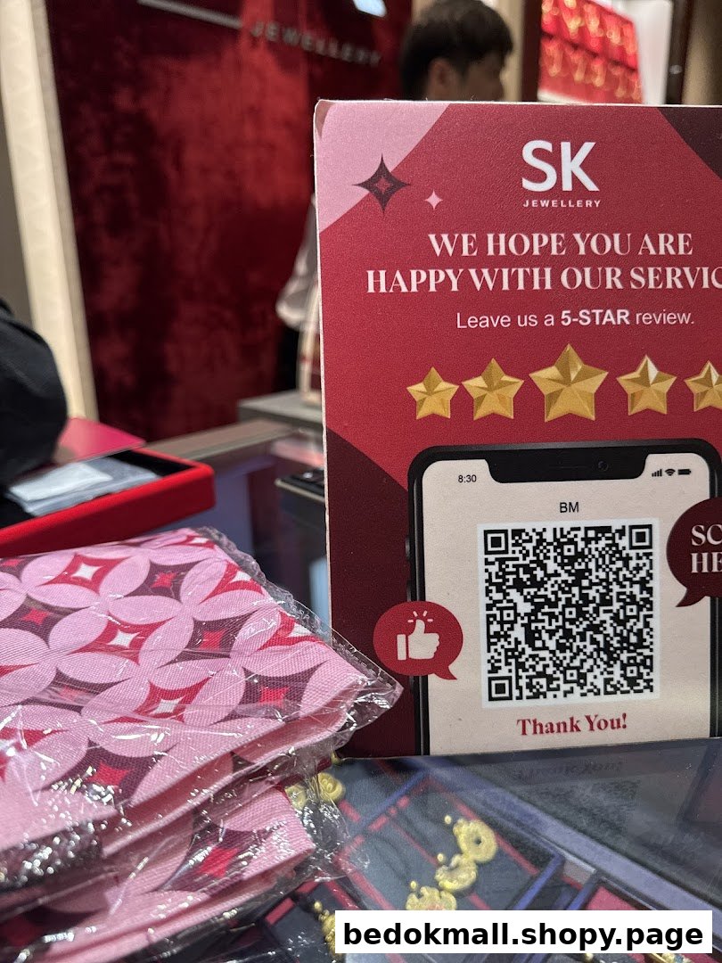 Close-up of a review sign with QR code and packaged items in a jewelry store.