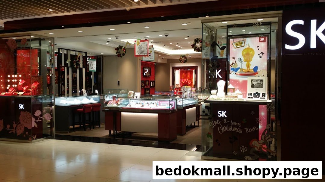 Front view of a jewelry shop with display cases and Christmas decorations.