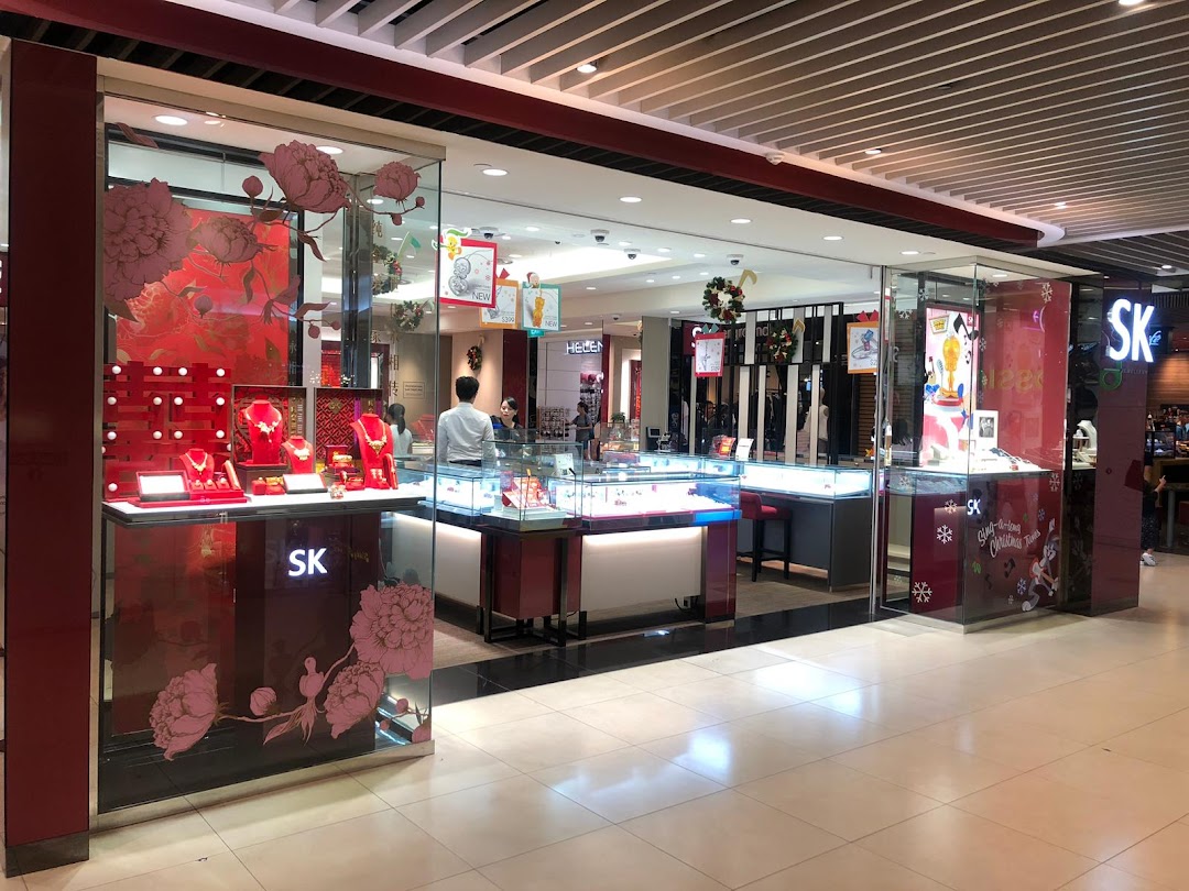 Jewellery shop exterior with display windows showcasing products and entrance.