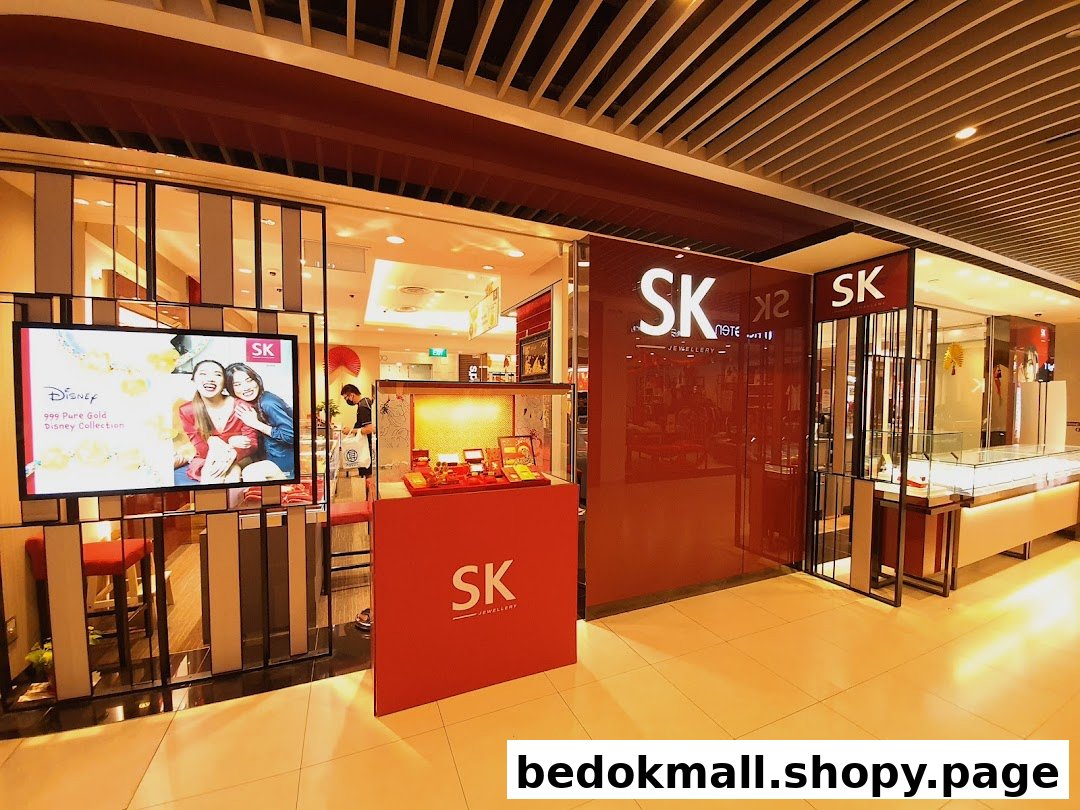Exterior view of SK Jewellery shop front with digital display and entrance.