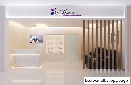 Modern shop interior with reception desk, product display, and waiting area.