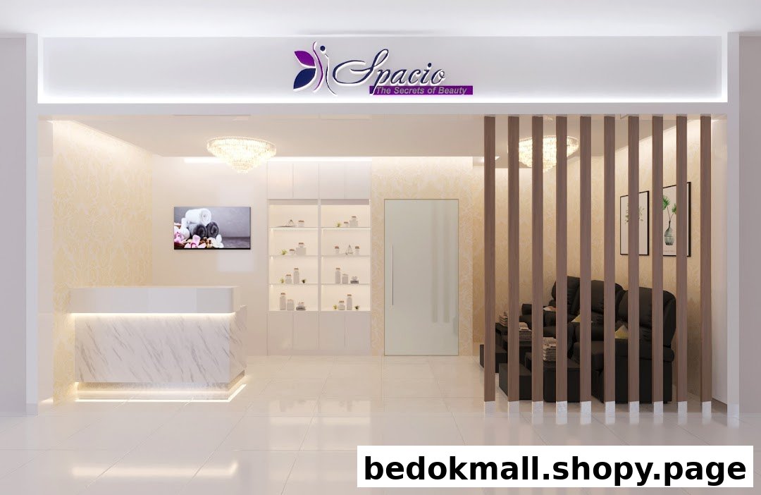 Modern shop entrance with reception desk, waiting area, and prominent sign.
