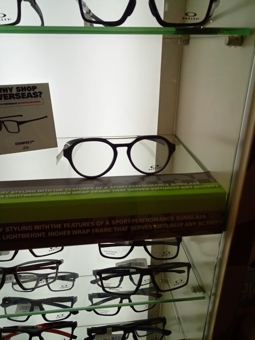 Close-up of an eyeglasses display case with multiple pairs of glasses.