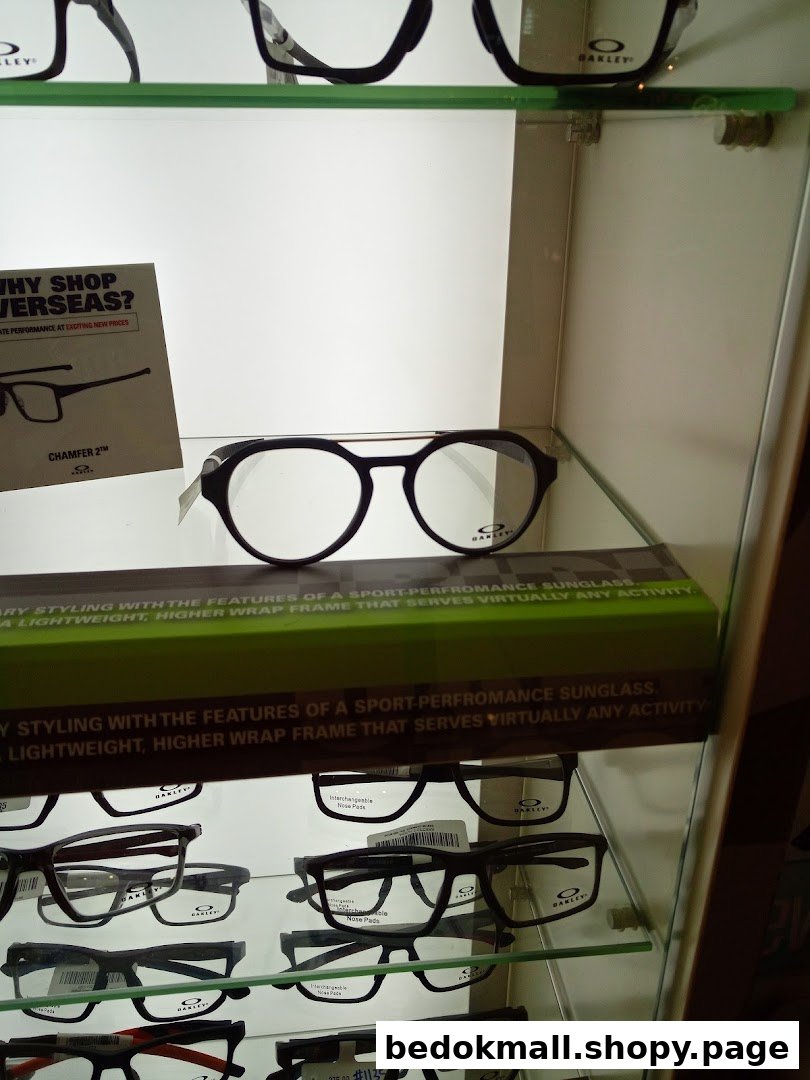 Close-up of an eyeglasses display case with multiple pairs of glasses.