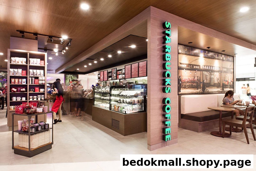 Starbucks interior with counter, merchandise shelves, and seating area.