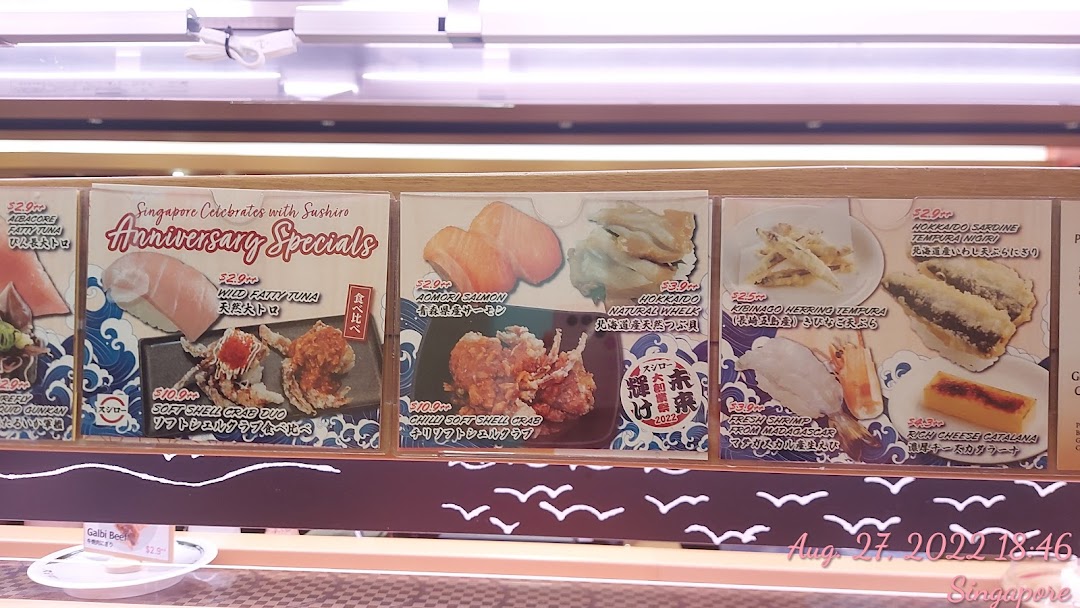 Menu display showing various sushi and seafood items with prices.