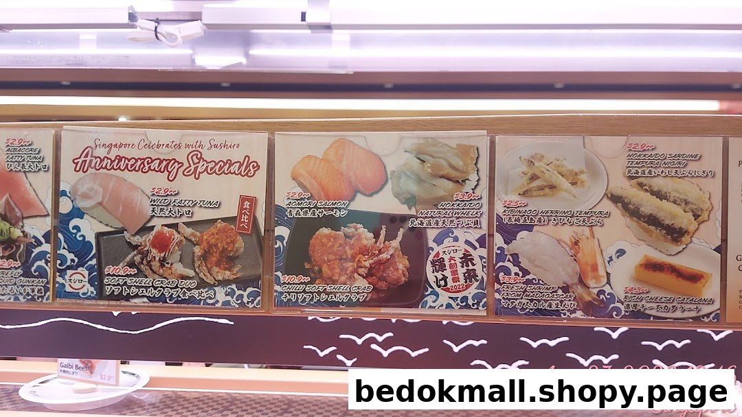 Menu display showing various sushi and seafood items with prices.