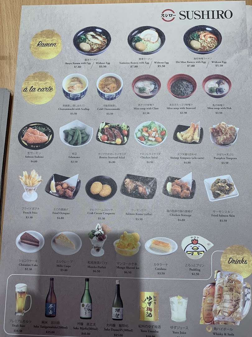 A detailed menu displaying various Japanese dishes and drinks with prices.