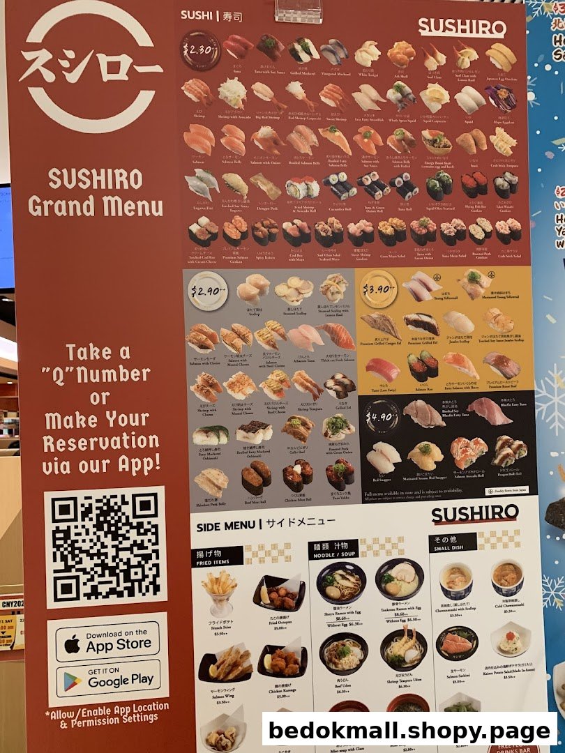 A large menu board displaying various sushi and side dishes with prices.