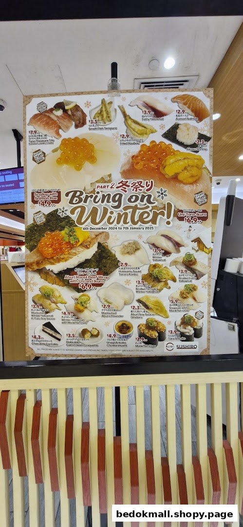 A promotional menu board for Sushiro's 'Bring on Winter!' special, featuring various sushi, sashimi, and side dishes.
