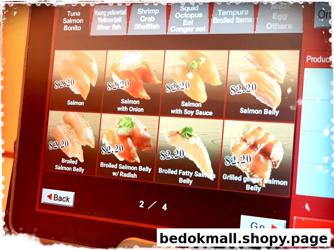 Close-up of a digital menu screen featuring various salmon sushi items.