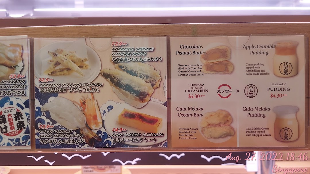Close-up of a restaurant menu displaying various food items and prices.