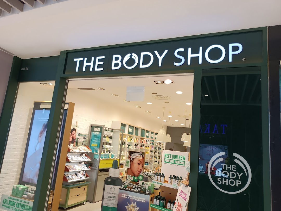 The Body Shop storefront with its prominent sign and products visible inside.