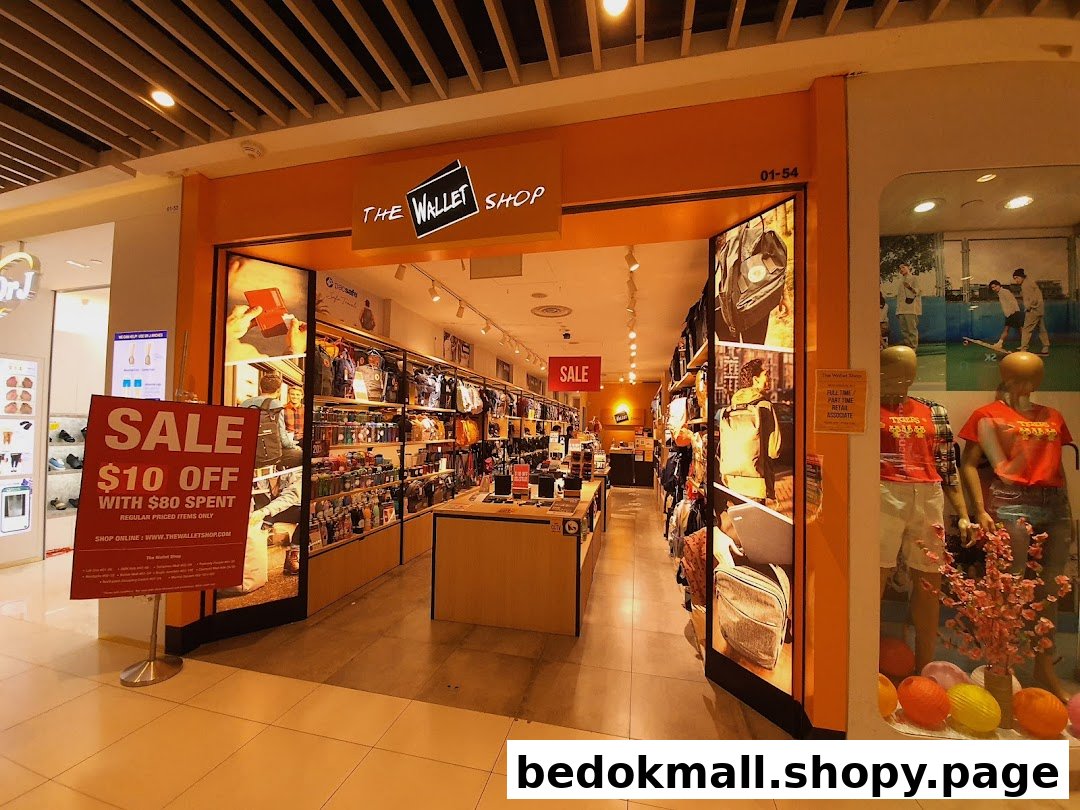 The Wallet Shop storefront with an open entrance and a sale sign.