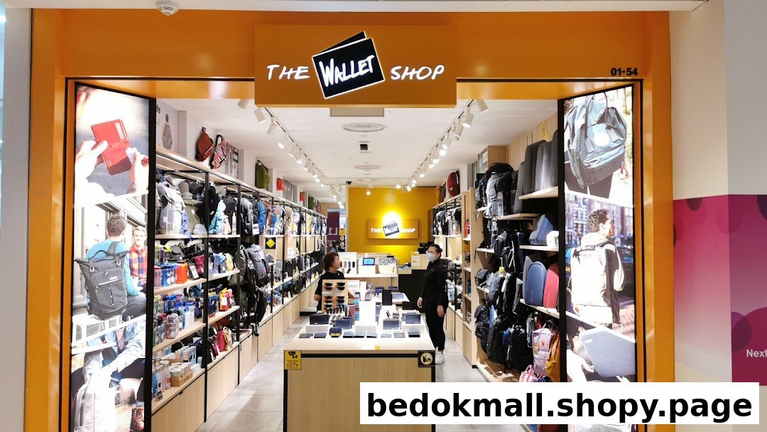Shop entrance with visible interior displaying wallets and bags.