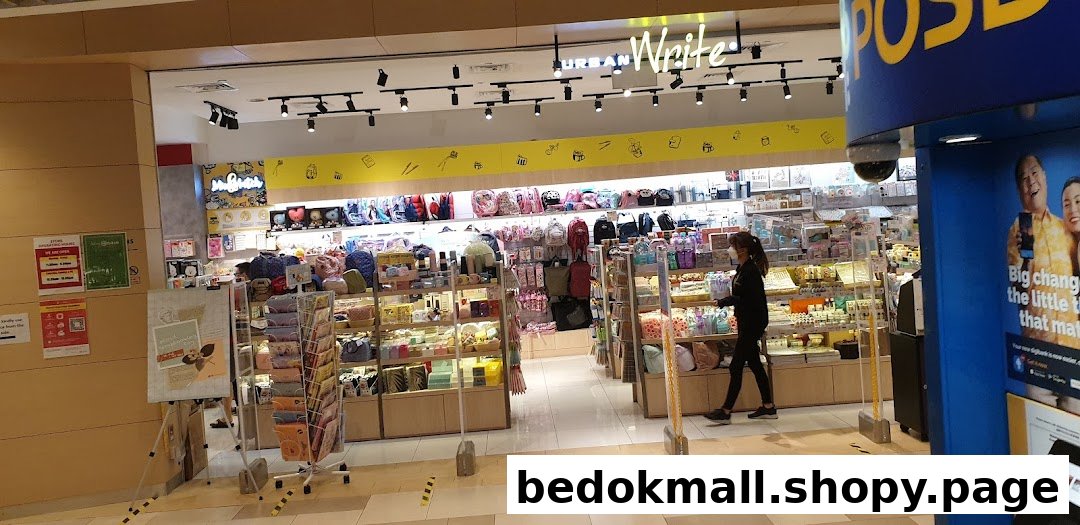 Shop entrance with products and a person inside UrbanWrite.