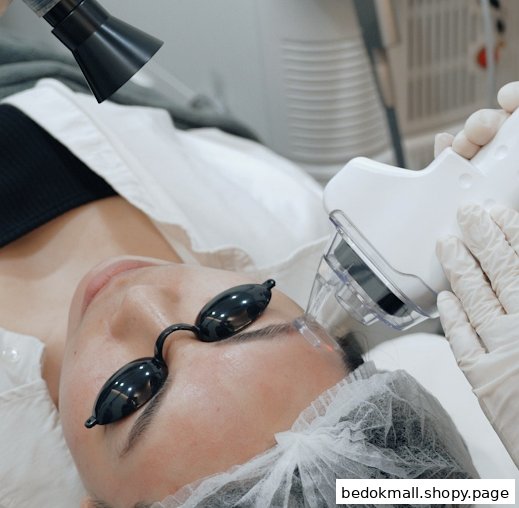 Client undergoing a laser aesthetic procedure with protective eyewear.