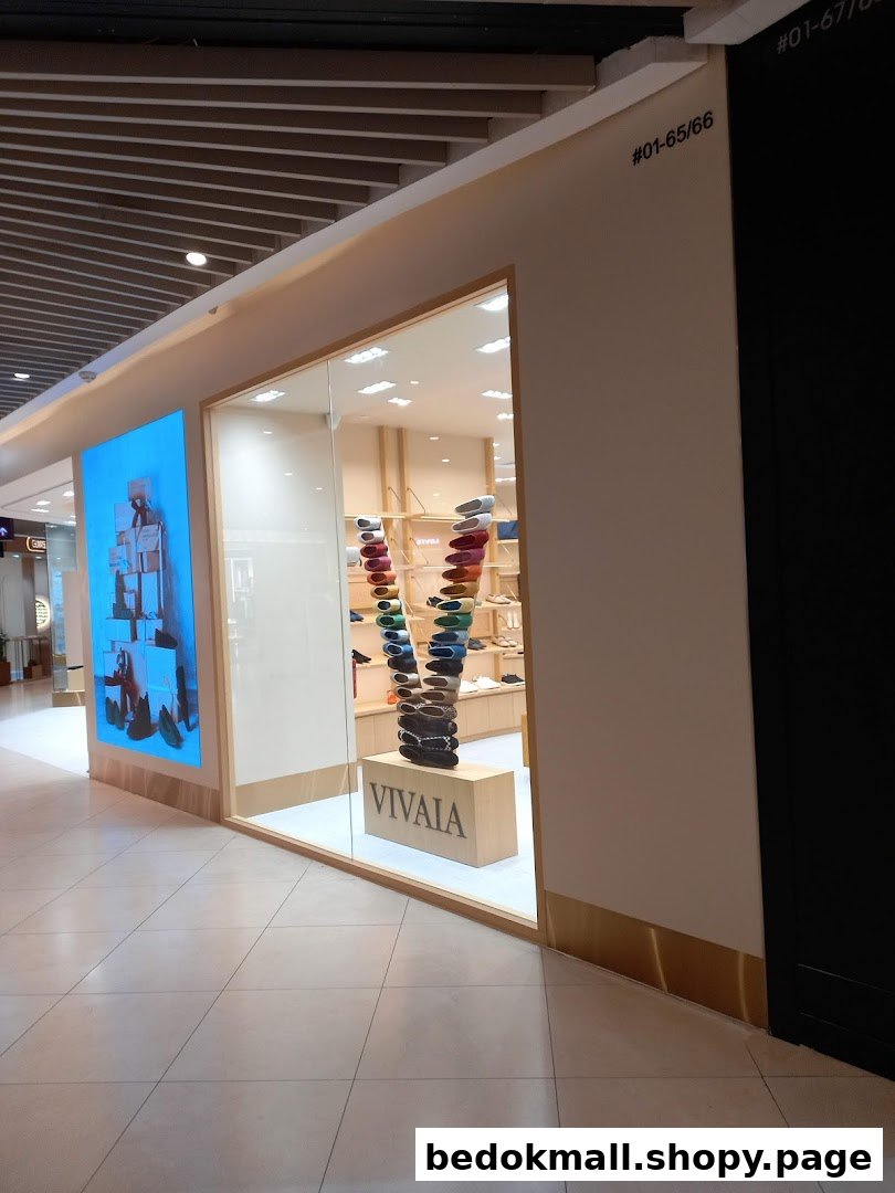 Exterior view of a VIVAIA shoe shop with a large display window.