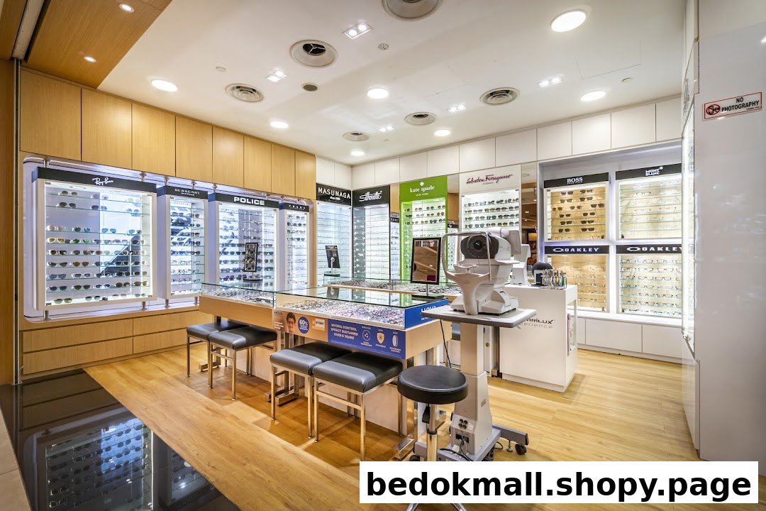 Interior of an optical shop with eyeglasses displays and an eye examination machine.