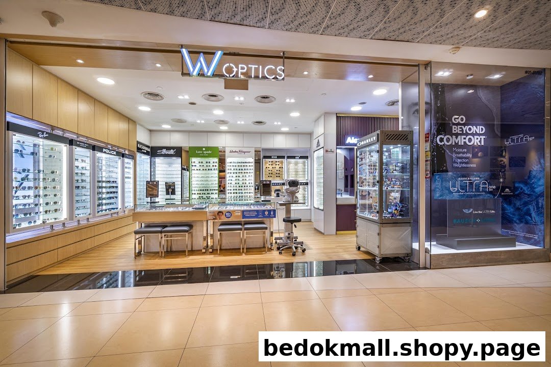 Entrance of W Optics, an optical shop displaying glasses and promotional materials.