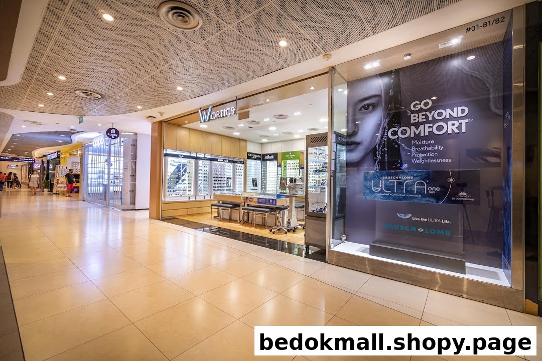 W Optics shop front with display window in a shopping mall.