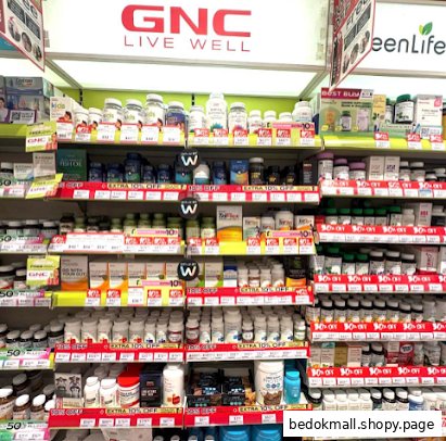 Shelves filled with health supplements and products inside a retail store.