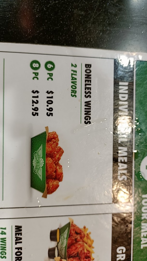 A Wingstop menu page displaying boneless wings and meal options with prices.