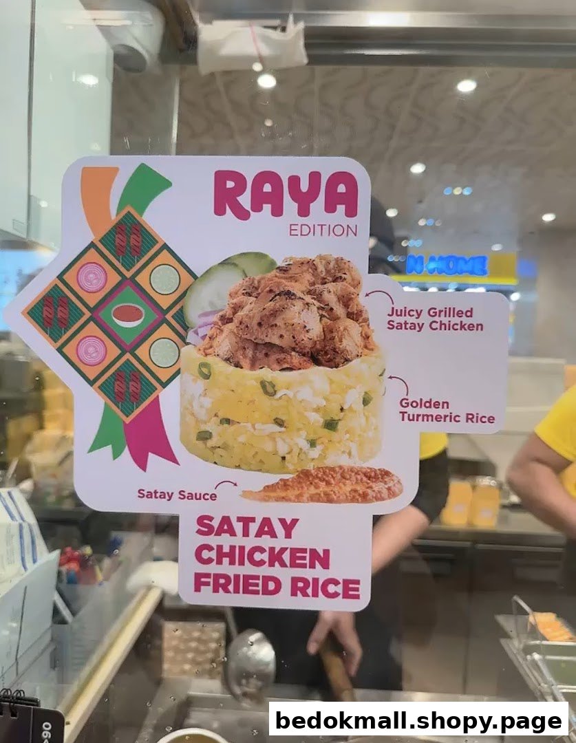 Promotional sign for Raya Edition Satay Chicken Fried Rice with dish image.
