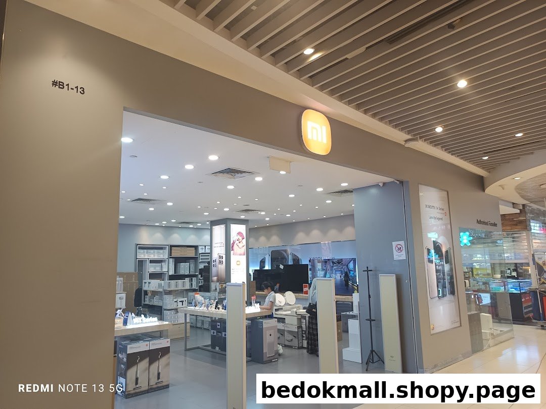 Entrance of a Xiaomi store with its logo and shop number visible.