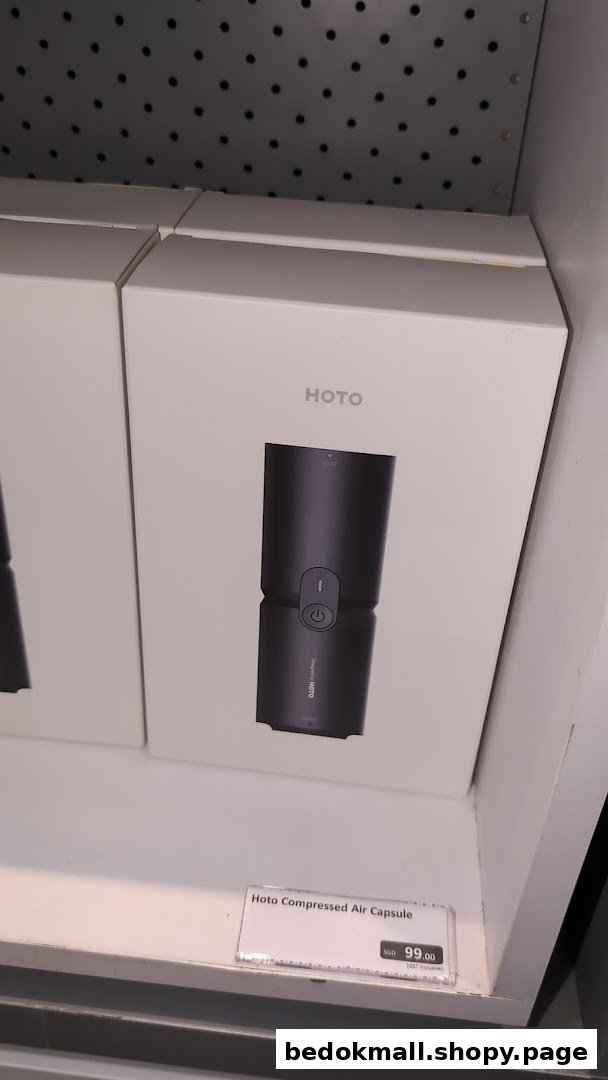 A Hoto Compressed Air Capsule product box is displayed on a shelf with a price tag.
